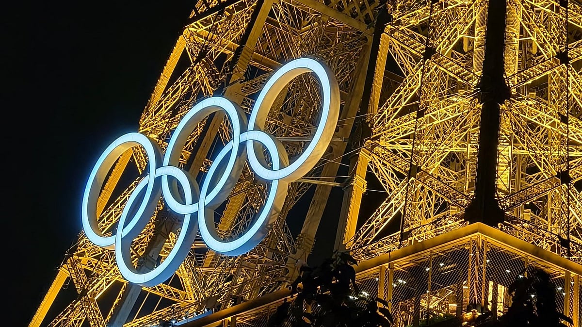 X | Team India : Olympics logo on the Eiffel Tower in Paris.